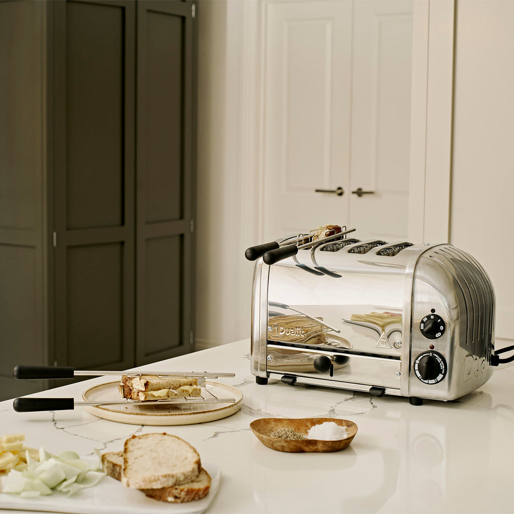 Dualit 4 Slice NewGen Classic Toaster Chrome sandwich preparation lifestyle